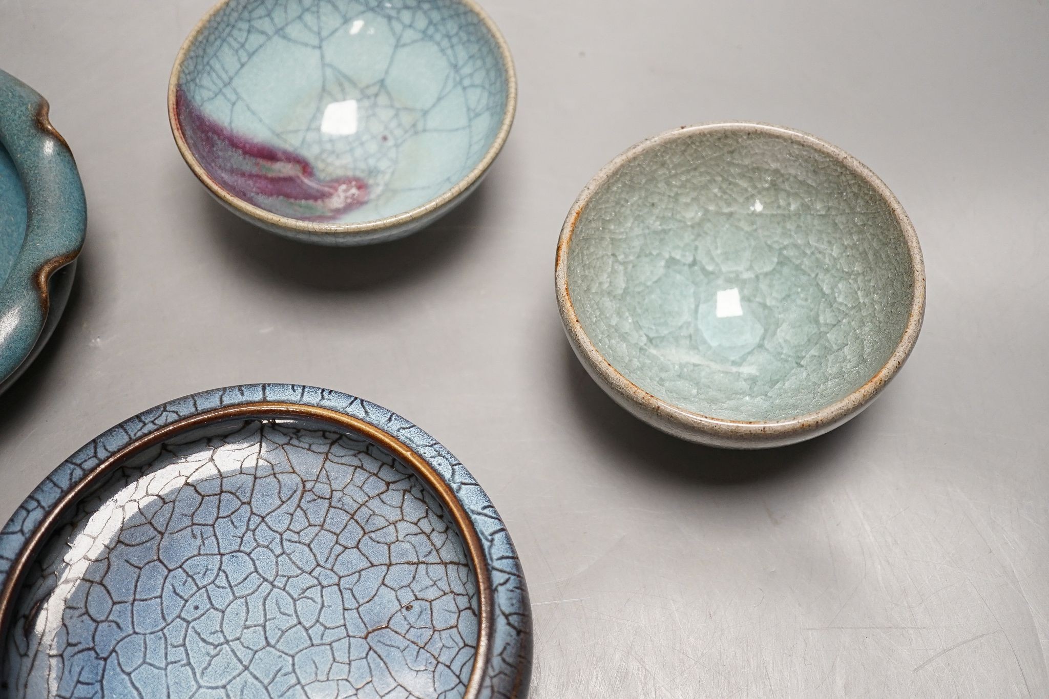 Four Chinese Jun type dishes/bowls, largest 14 cms diameter.